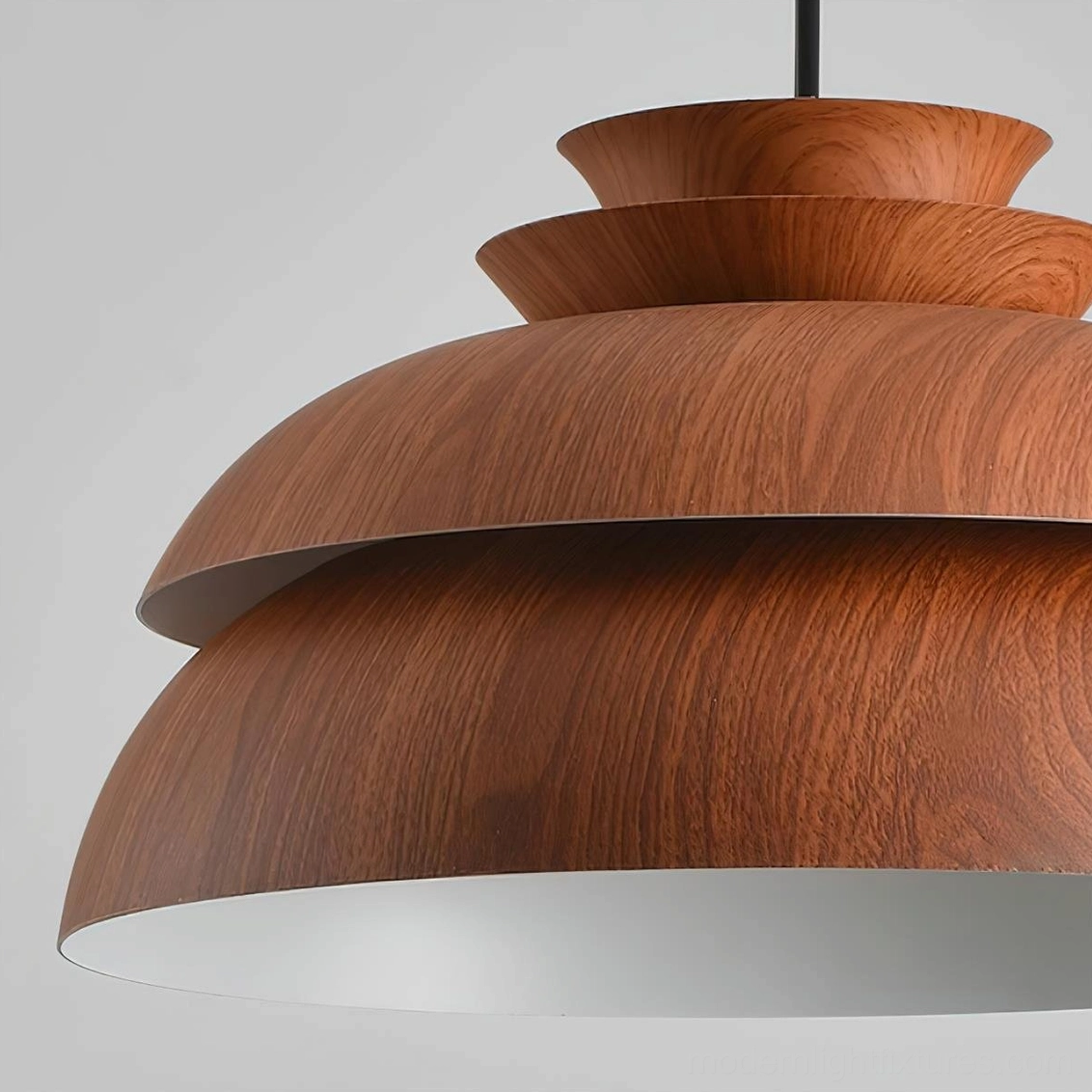 Midori modern tiered wood pendant light with sculptural layered design and warm luminosity