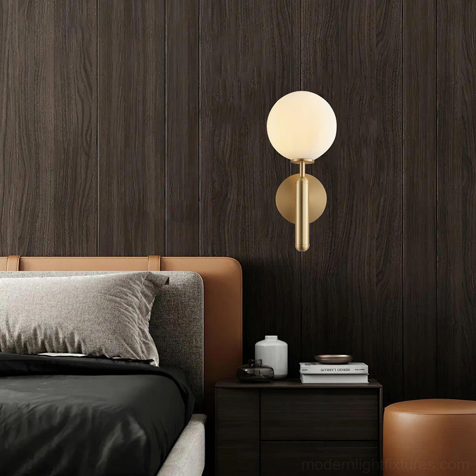 Minimalist Miira wall light mounted on dark wood paneled bedroom wall, contemporary Nordic design