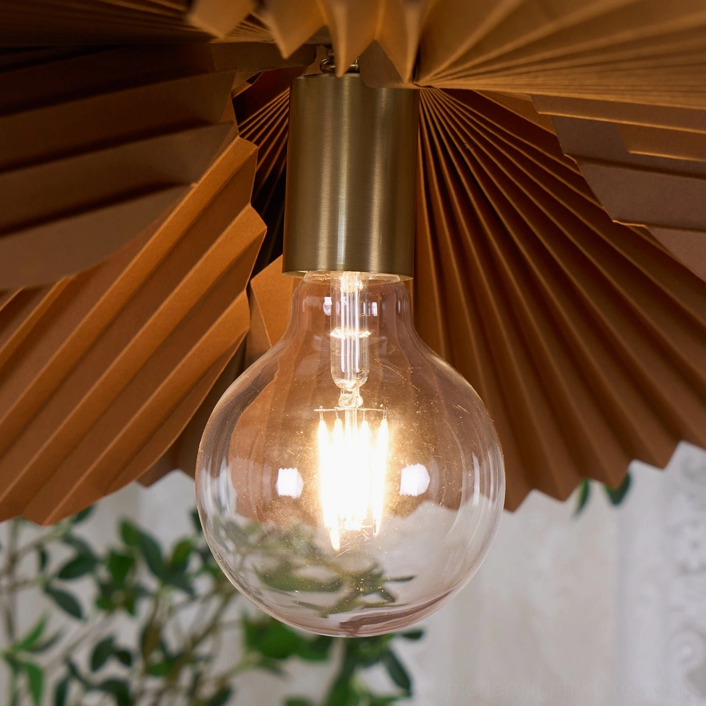 Mikado pendant light showcasing fan-like pleated shade structure in contemporary loft setting