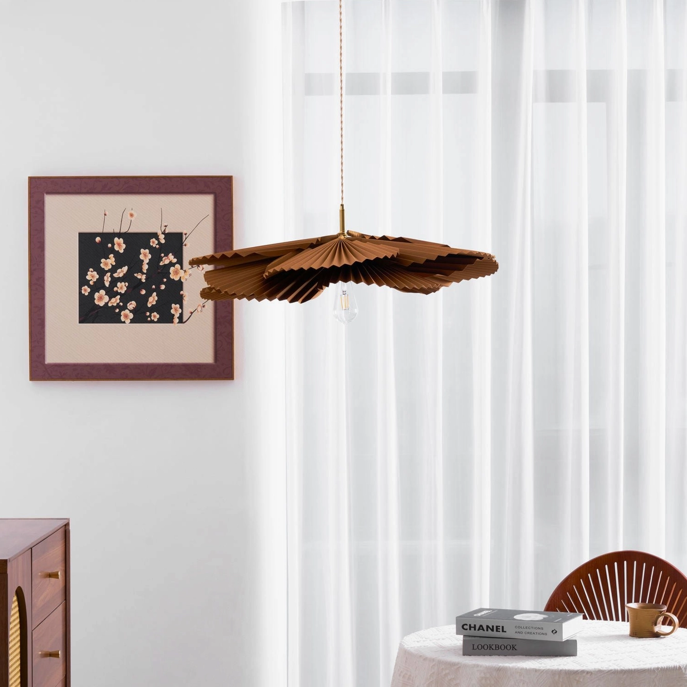Mikado pleated pendant lamp creating shadow play and light diffusion effects on interior surfaces