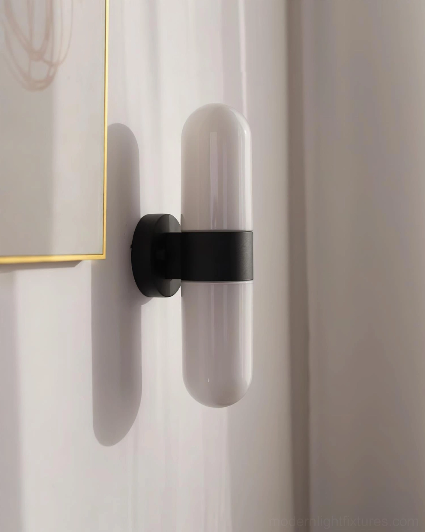 Contemporary wall sconce fixture detail - frosted glass and metal construction