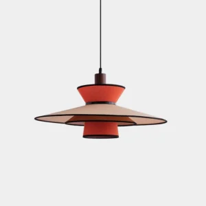 Milano tiered pendant light with warm beige and burnt orange fabric shade, black metal trim, and walnut wood top – front studio view