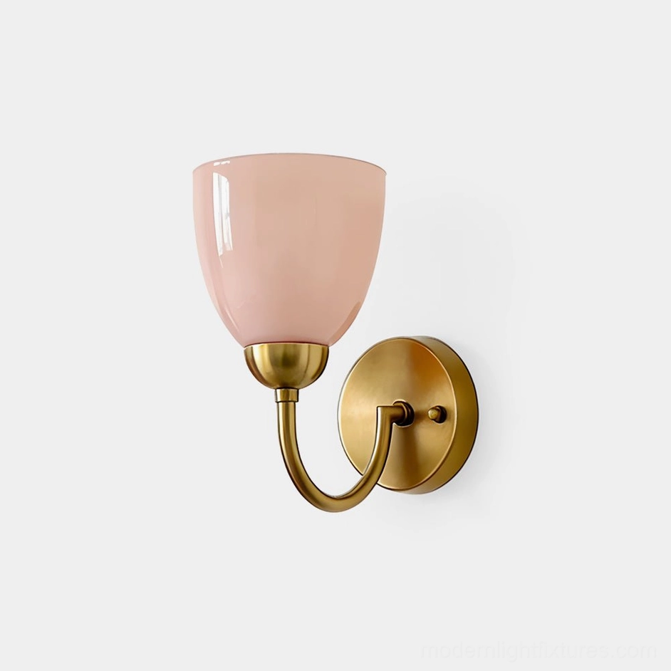 Mild Velin frosted glass wall sconce with brass arm in gold and pink - close-up studio view
