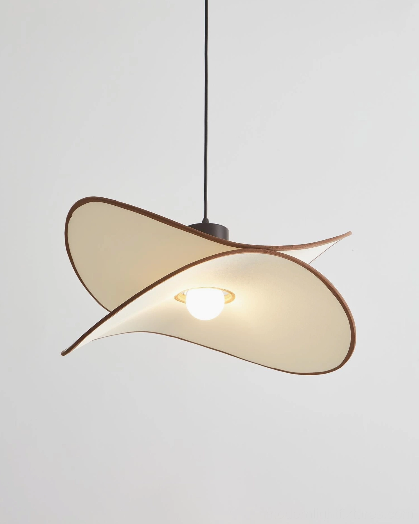 Miley organic fabric pendant light detail revealing inner light diffusion and soft glow characteristics through translucent shade