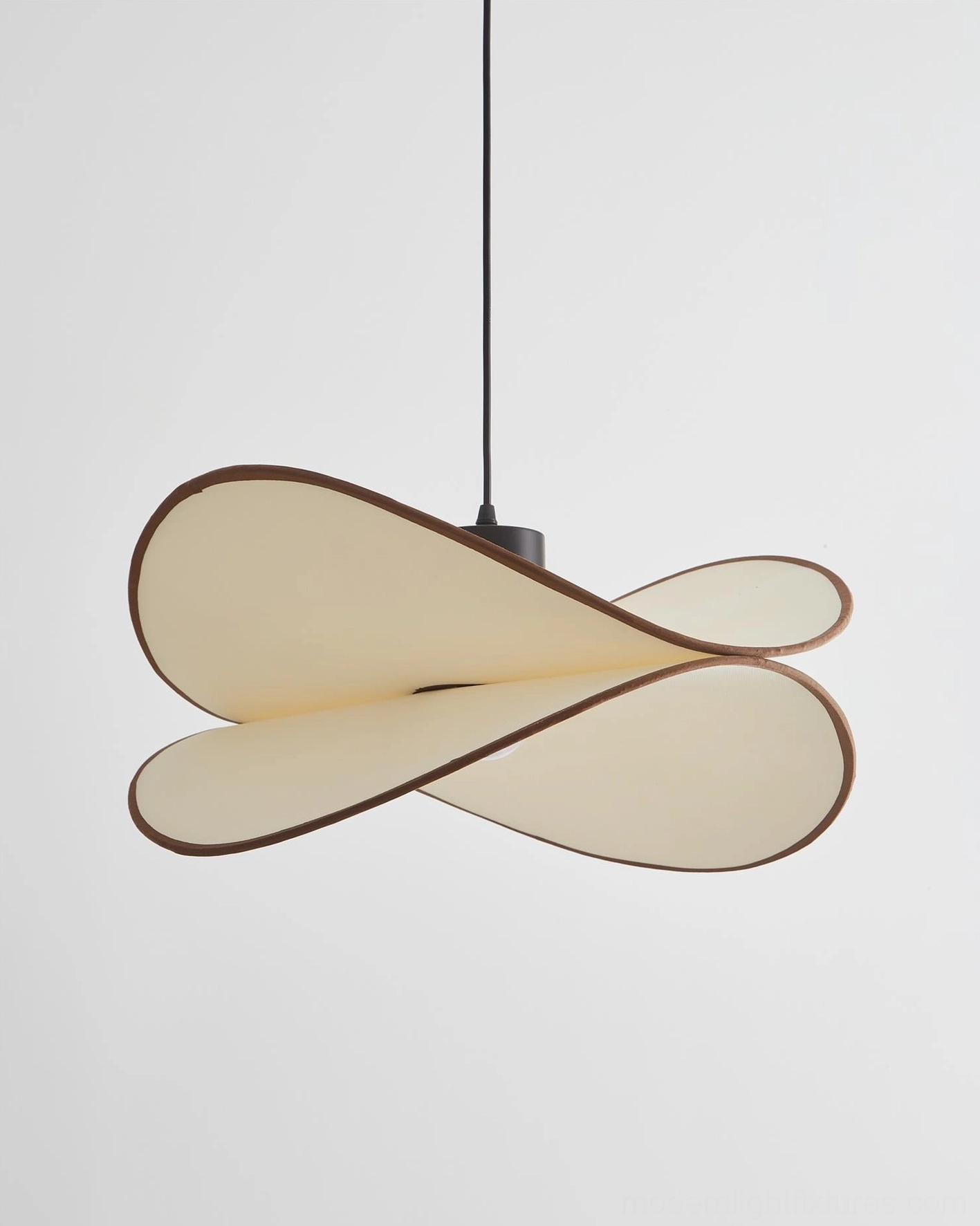 Miley twisted petal fabric pendant lamp suspended in contemporary interior space showing size proportion and warm illumination effect