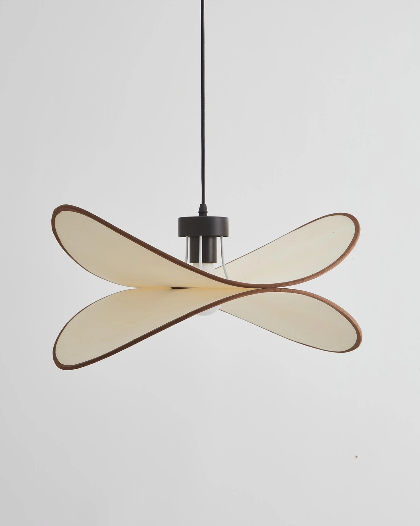 Miley curved fabric pendant light suspended in scandinavian nordic interior showcasing seamless style integration