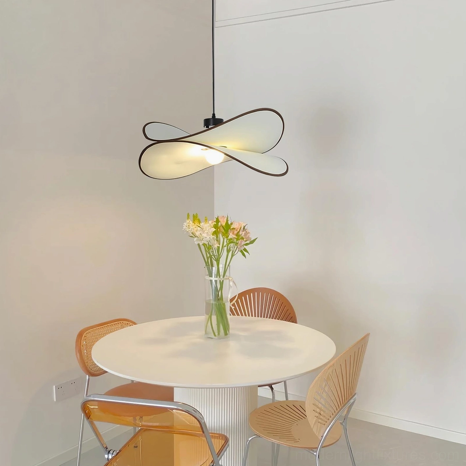 Miley organic fabric pendant lamp showcasing sculptural petal design and warm light dispersal in modern living space