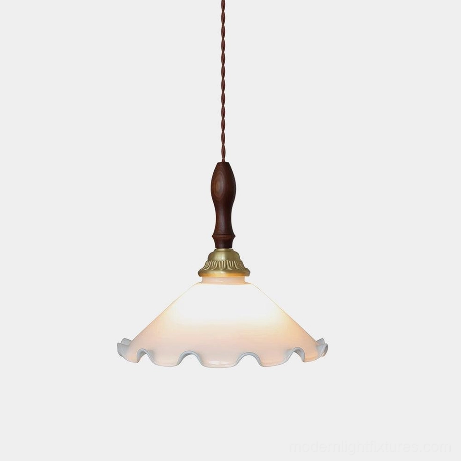 Vintage milky flower pendant light with ruffled frosted glass shade and brass hardware, front view on white background