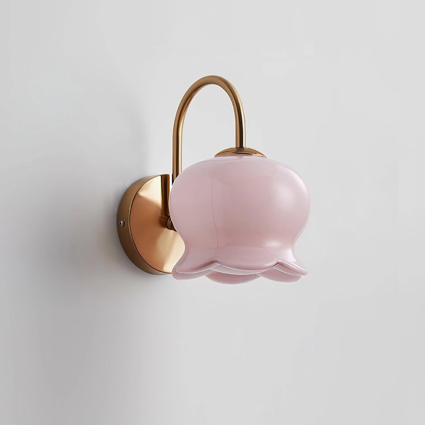Millie Bells ceramic wall sconce light with bell pendant design, bow accent detail, and metal bracket mounting hardware