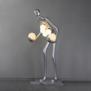 Modern sculpture floor lamp with artistic human figure holding multiple frosted light spheres, silver metallic finish