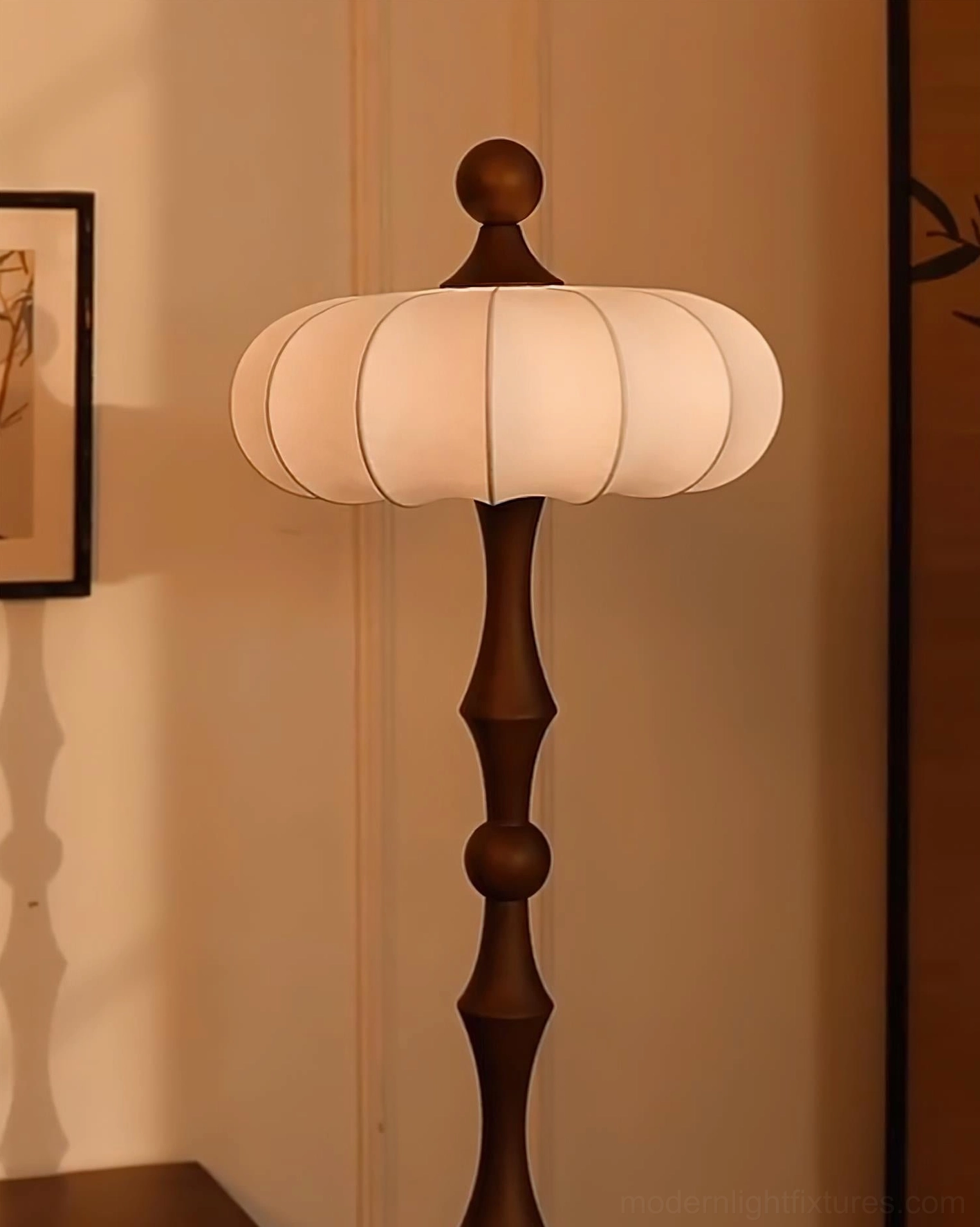 Milo mid-century modern floor lamp with spherical and spindle-turned wood elements, contemporary sculptural lighting fixture