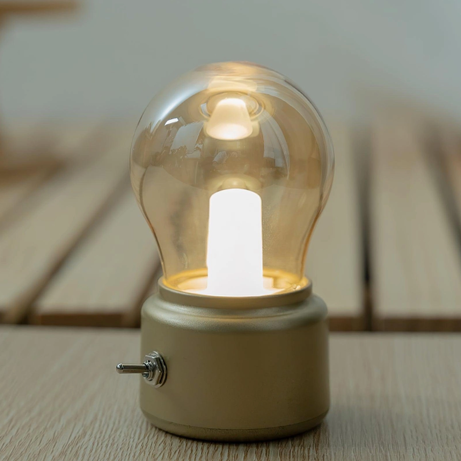 Compact Edison-style bulb table lamp detailed view showing lever switch and metal construction