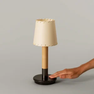Touch switch control detail on Minima rechargeable portable table lamp base with hand interaction demonstration