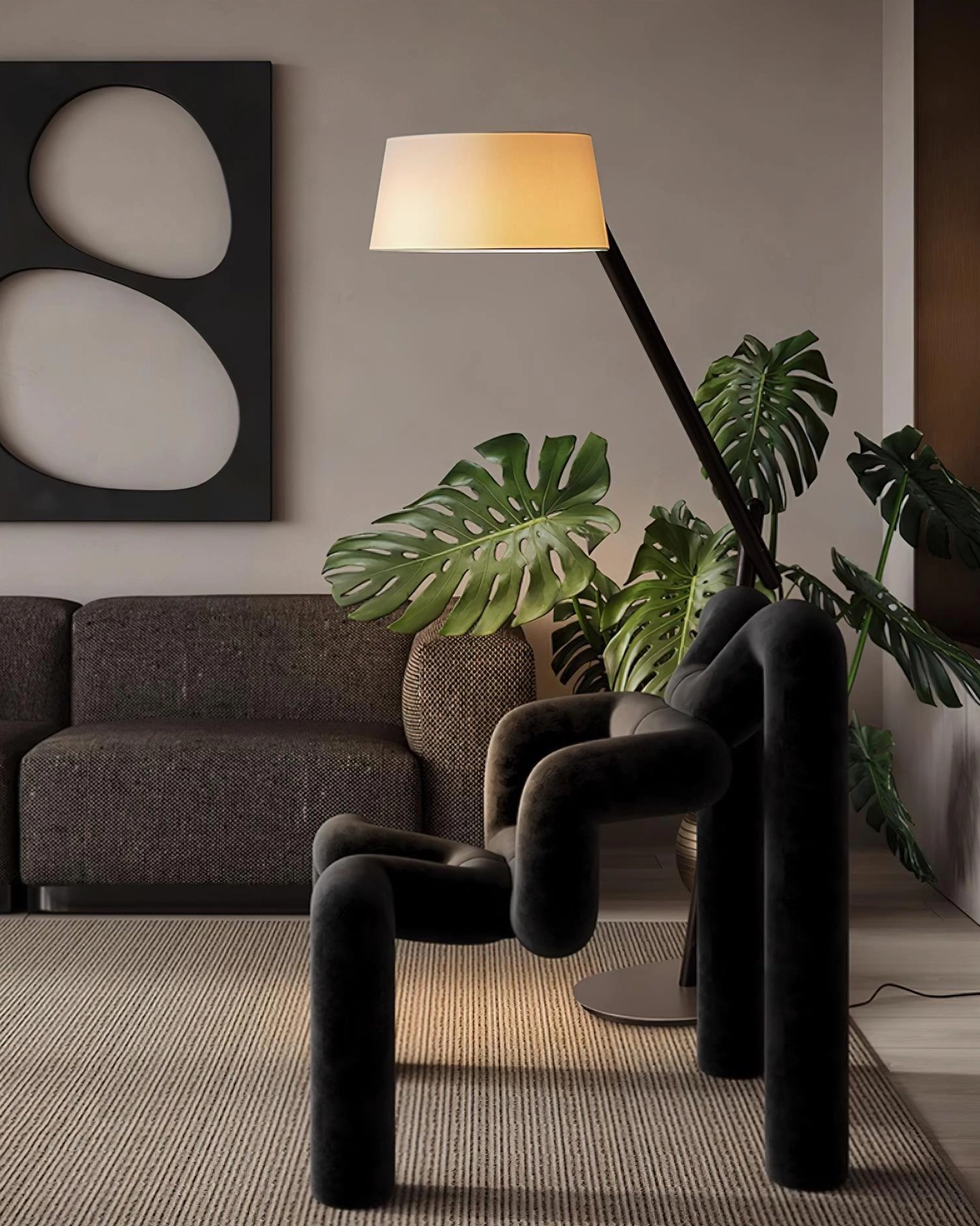 Minimalist arc floor lamp with elegant arm suspension and softly curved shade for ambient lighting