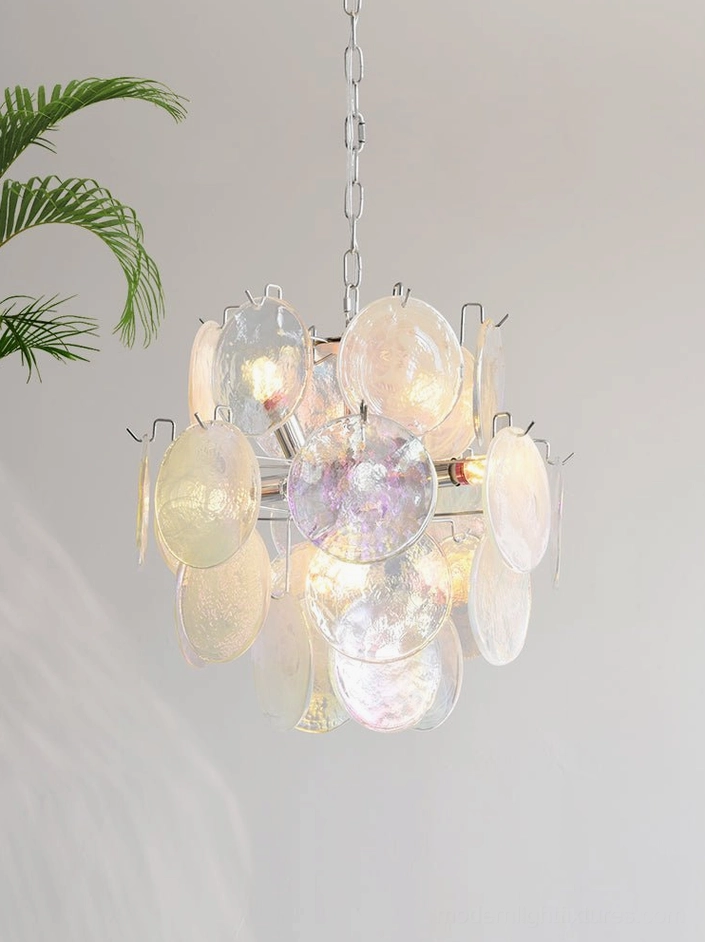 Iridescent glass disc pendant light in minimalist interior showing mid-century aesthetic