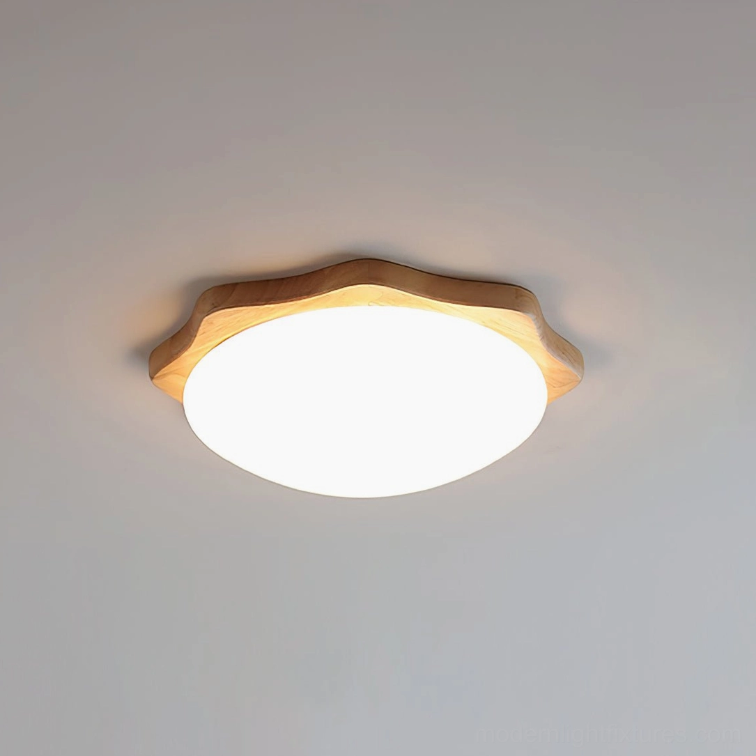 Natural maple wood ceiling fixture with white acrylic diffuser in modern minimalist living space