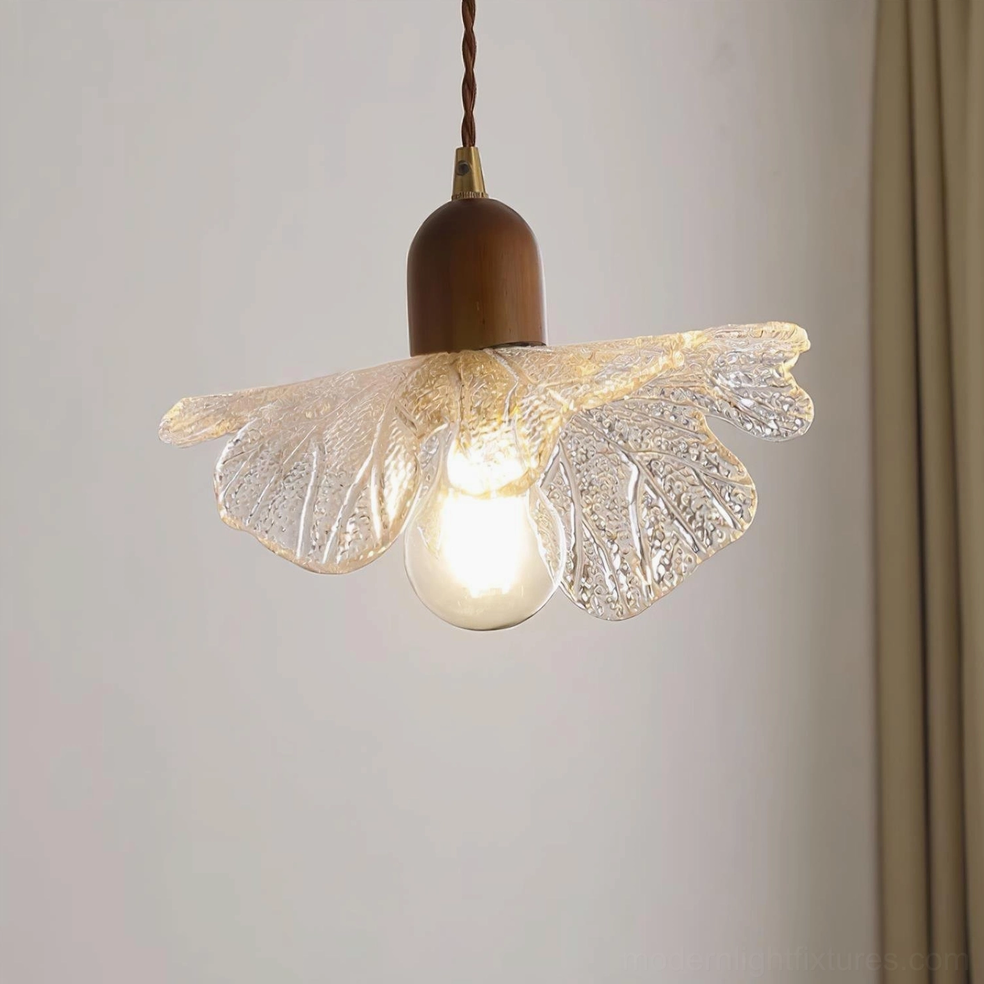 Minimalist petal glass pendant light with exposed bulb design and textured glass shade