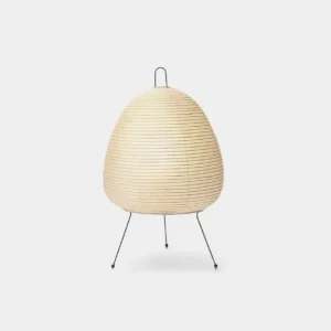 Minimalist ribbed paper table lamp with black metal tripod base on white background, front view