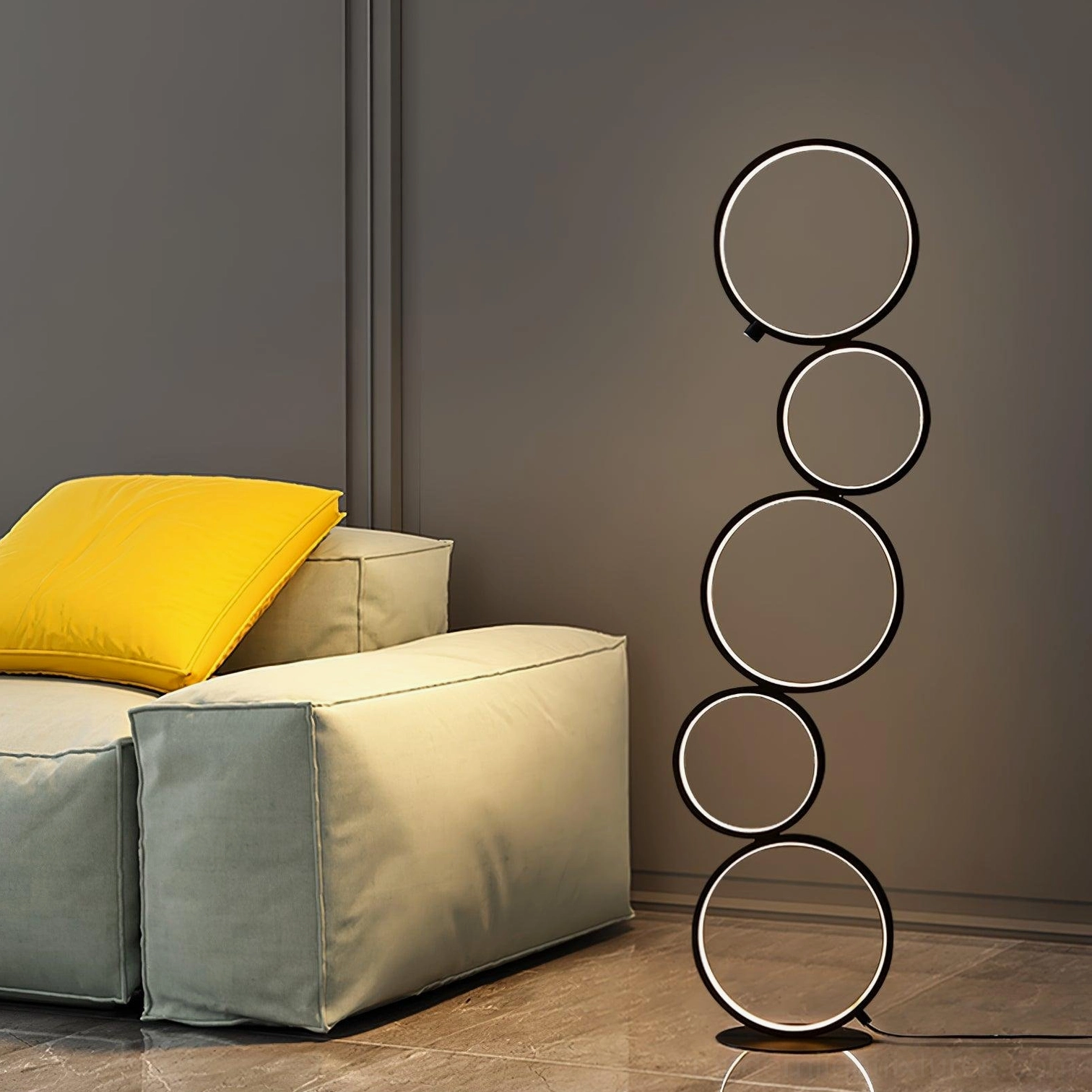 Sleek circular ring floor lamp showing contemporary minimalist design and architectural form factor
