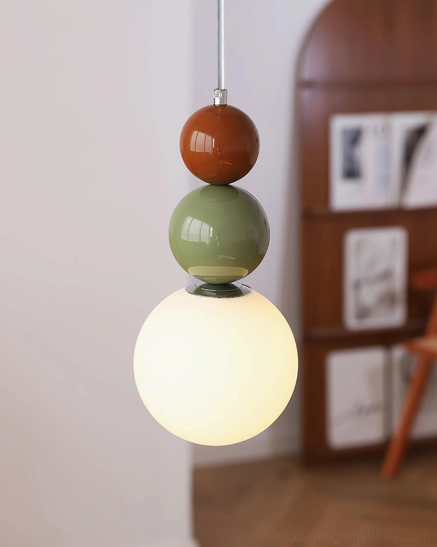 Minimalist stacked glass ball pendant light embodying Scandinavian design philosophy