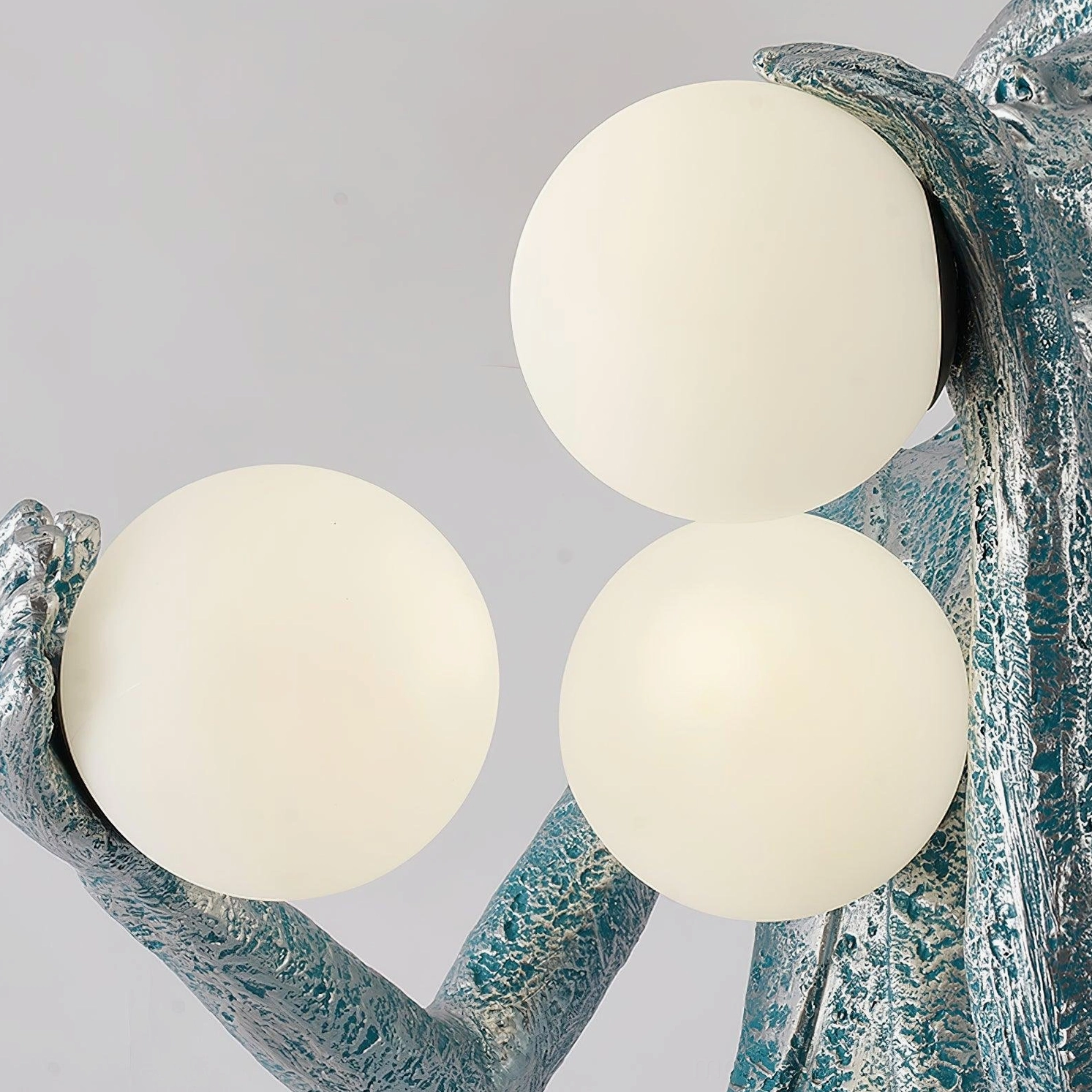 Sculptural floor lamp humanoid form with frosted glass orbs contemporary minimalist design