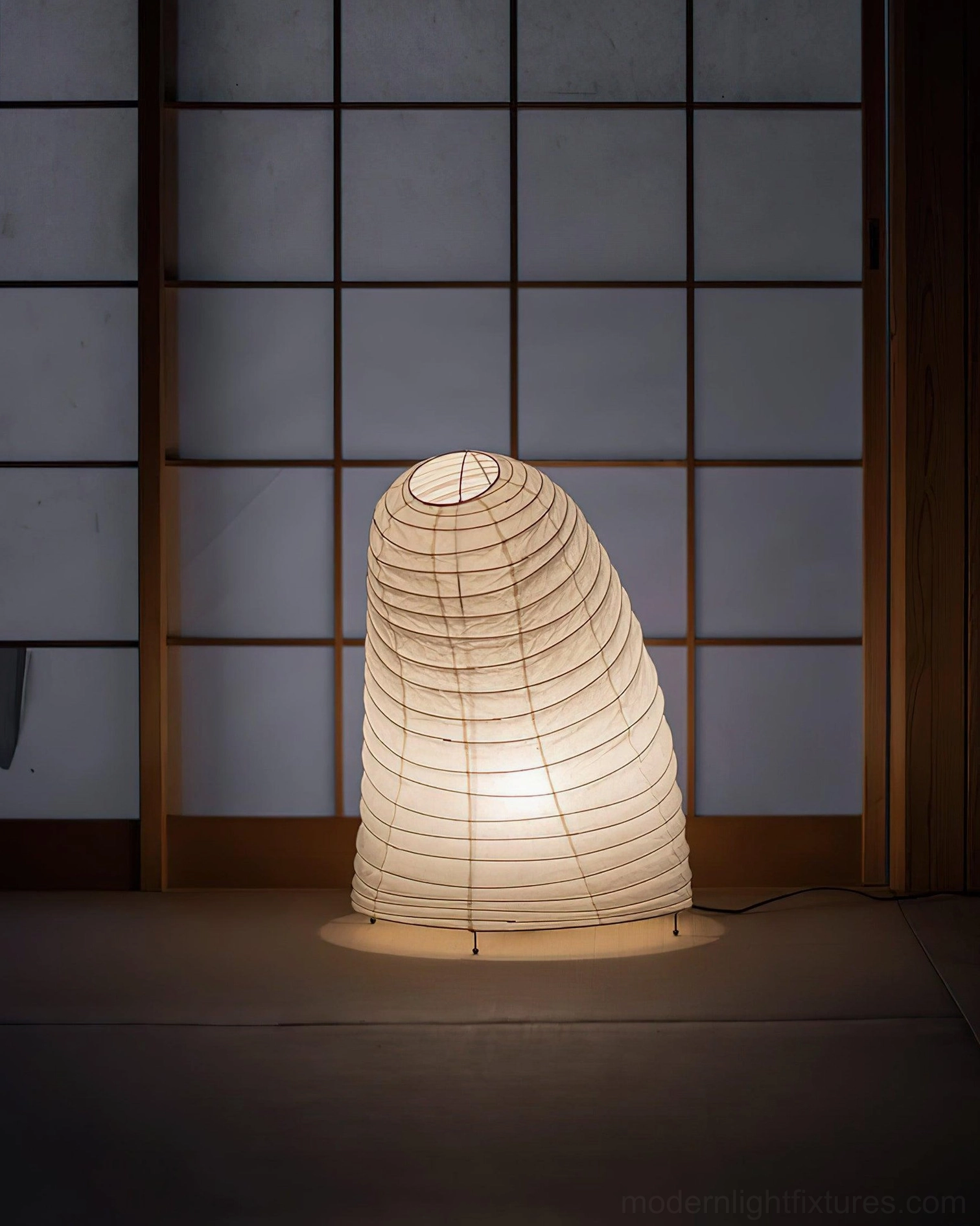 Minimalist contemporary table lamp with paper shade architectural design showcase shot