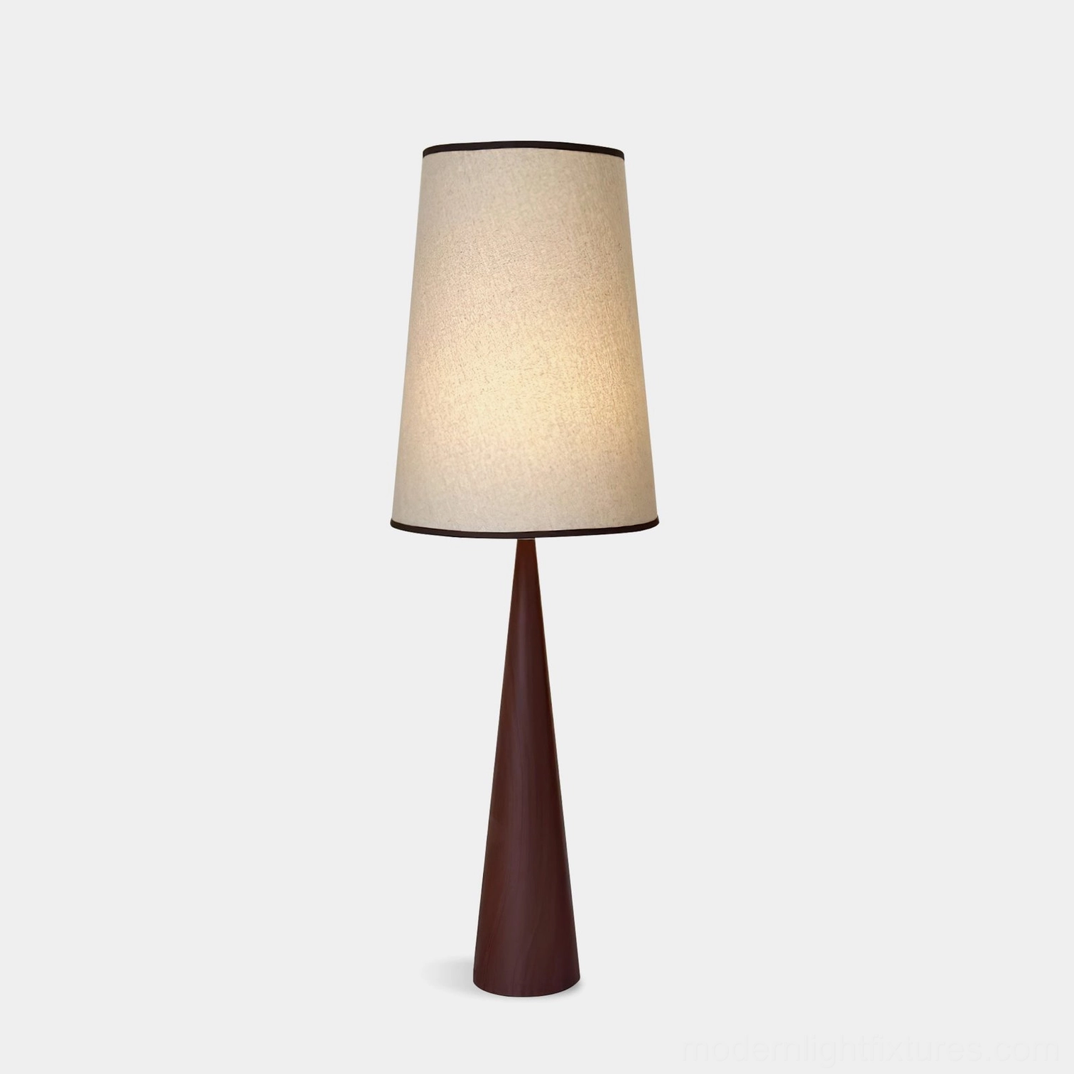 Ernest minimalist tapered floor lamp with walnut wooden base and off-white fabric shade displayed in studio setting