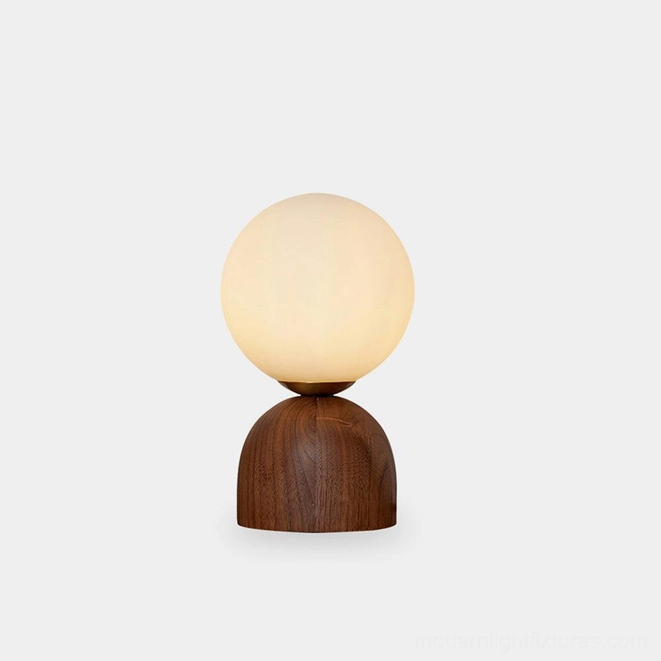 Minimalist walnut wood globe table lamp with frosted glass shade on pure white background, Nordic design pendant