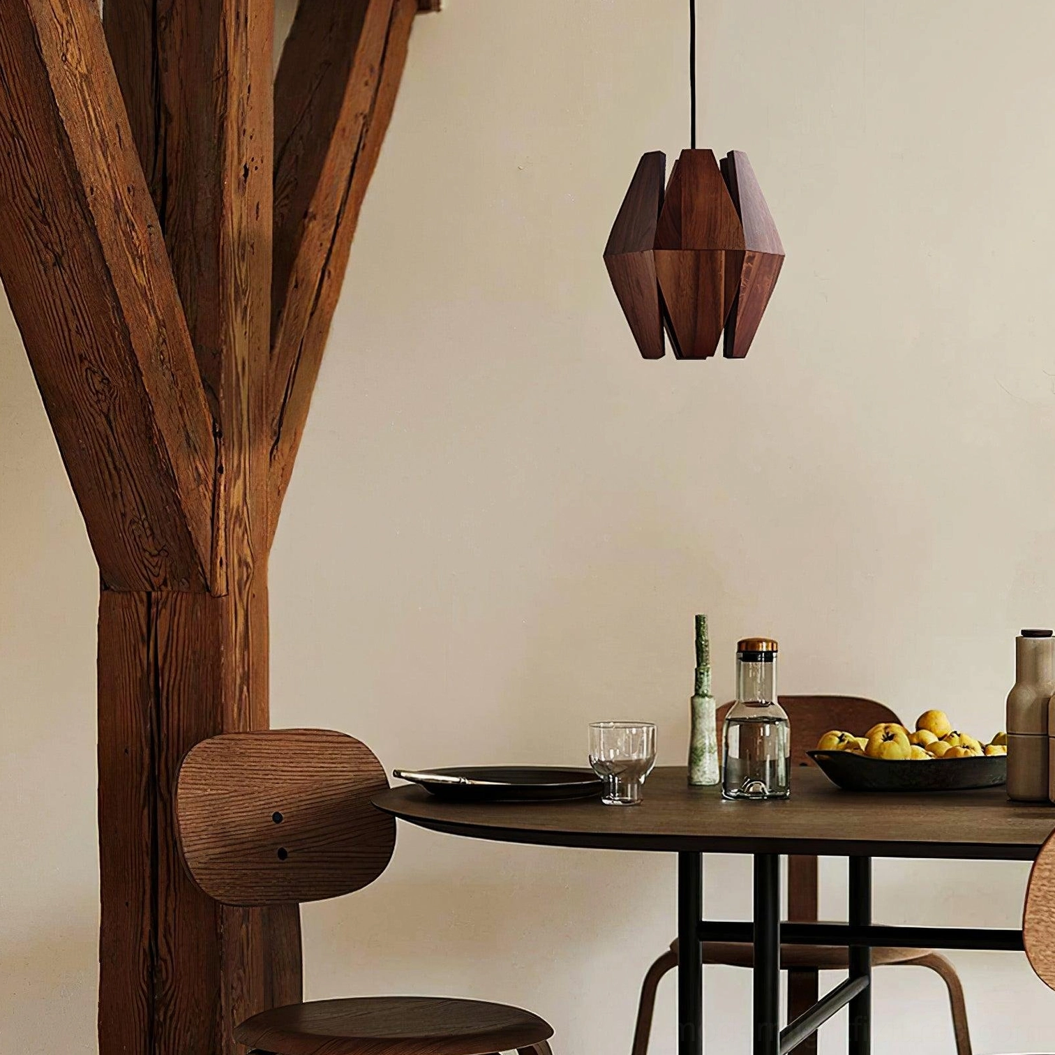 Minimalist wood pendant light fixture showcasing clean lines and organic geometry
