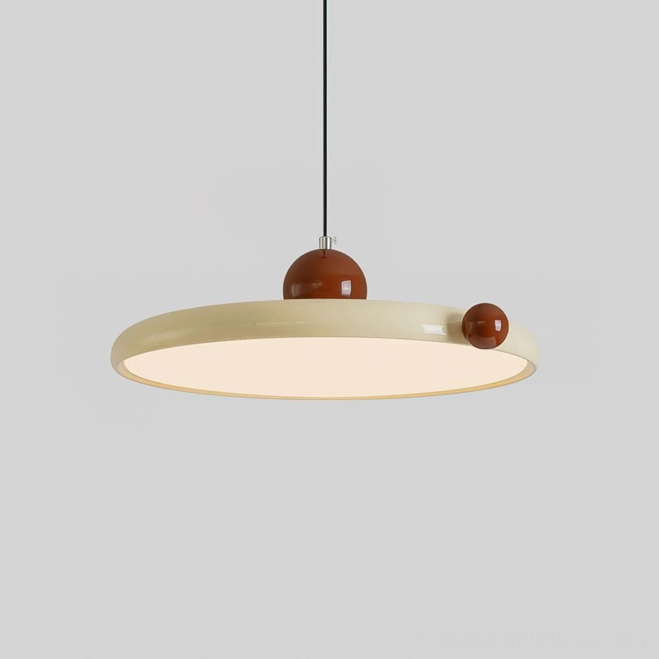 Contemporary disc pendant lamp with dual-tone finish, beige and red color combination, studio shot