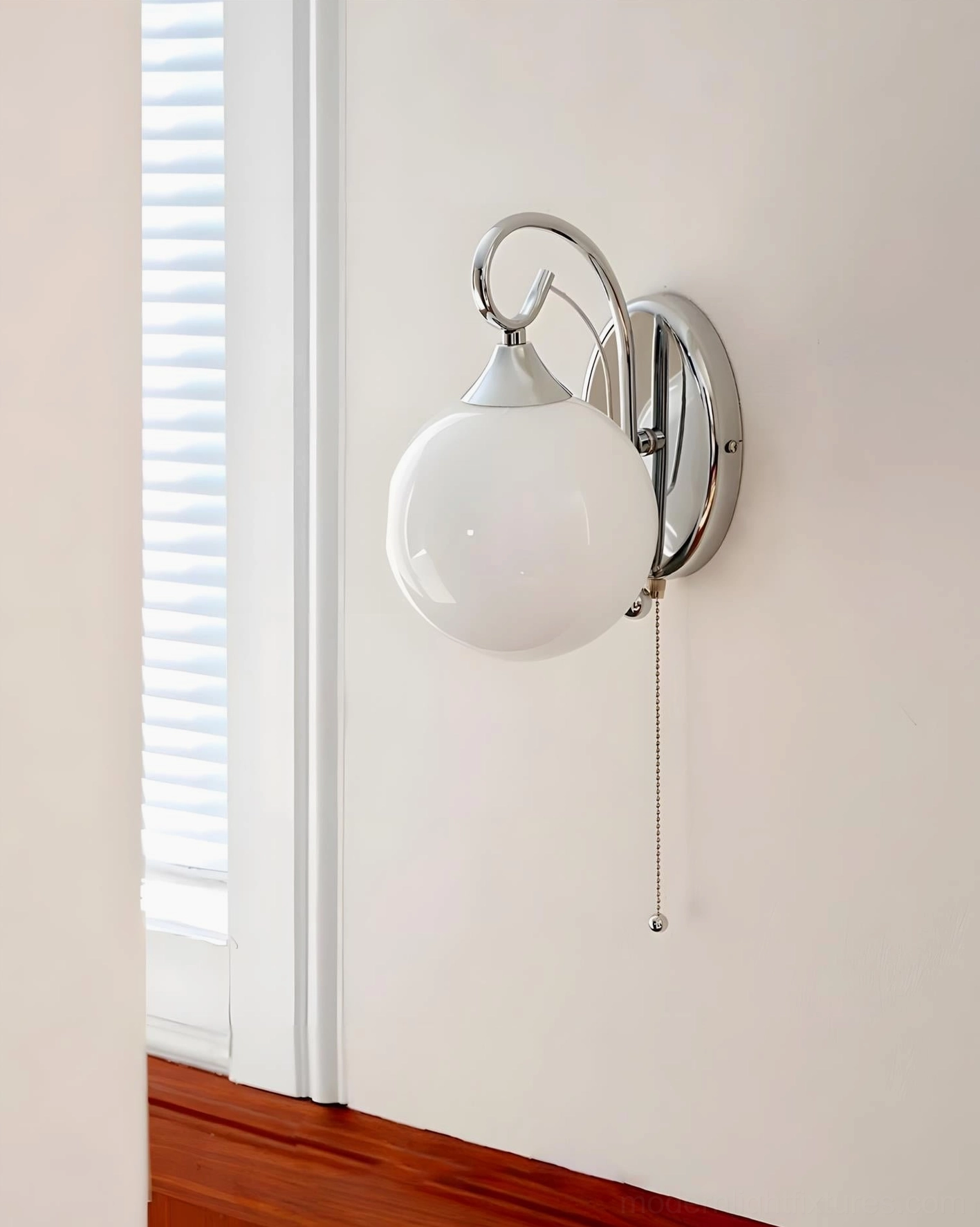 Contemporary glass globe wall sconce in interior design setting, mid-century modern bedroom ambient lighting
