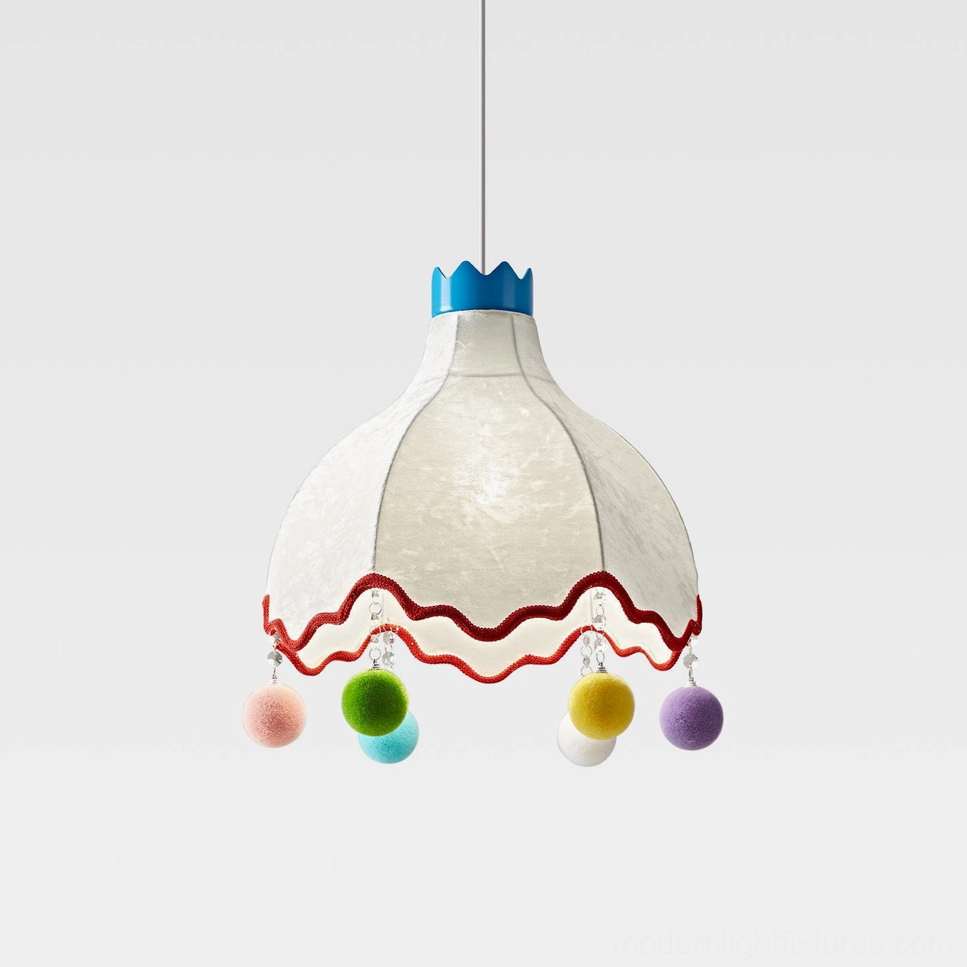Mireo whimsical pendant light with dome fabric shade, blue crown finial, and accurately positioned multicolor pom-pom decorations