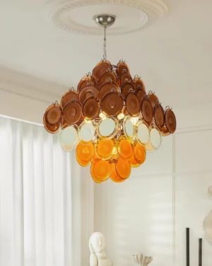 Overhead view of Miretta chandelier suspended in minimalist bedroom - tiered glass discs creating warm ambient lighting