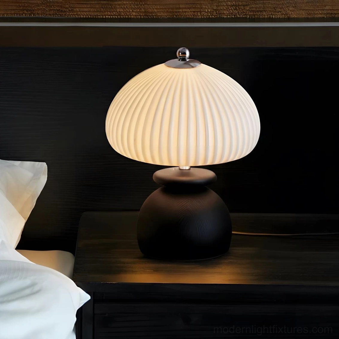 Modern black wooden base table lamp with white pleated dome shade, bedroom bedside styling