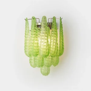 Spring green textured glass wall sconce showing exposed metal bracket hardware, contemporary artistic design