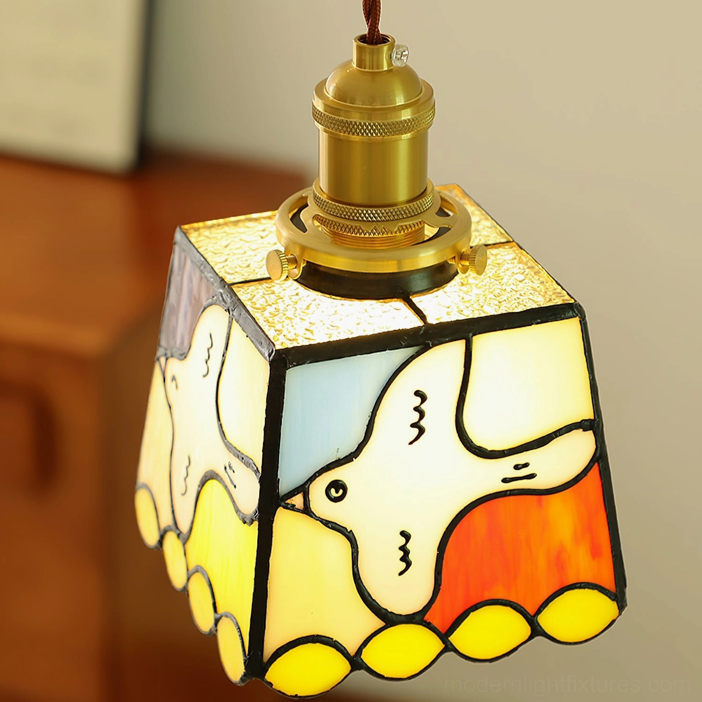 Miroa pendant lamp close-up detail stained glass dove scallop trim brass