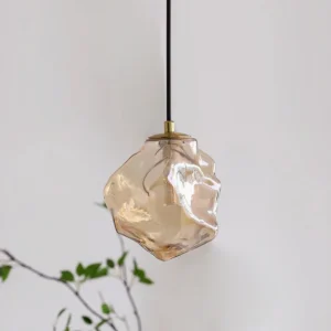 Mirza amber glass pendant lamp with warm golden tone, hand-shaped irregular form, artistic glassmaking craftsmanship