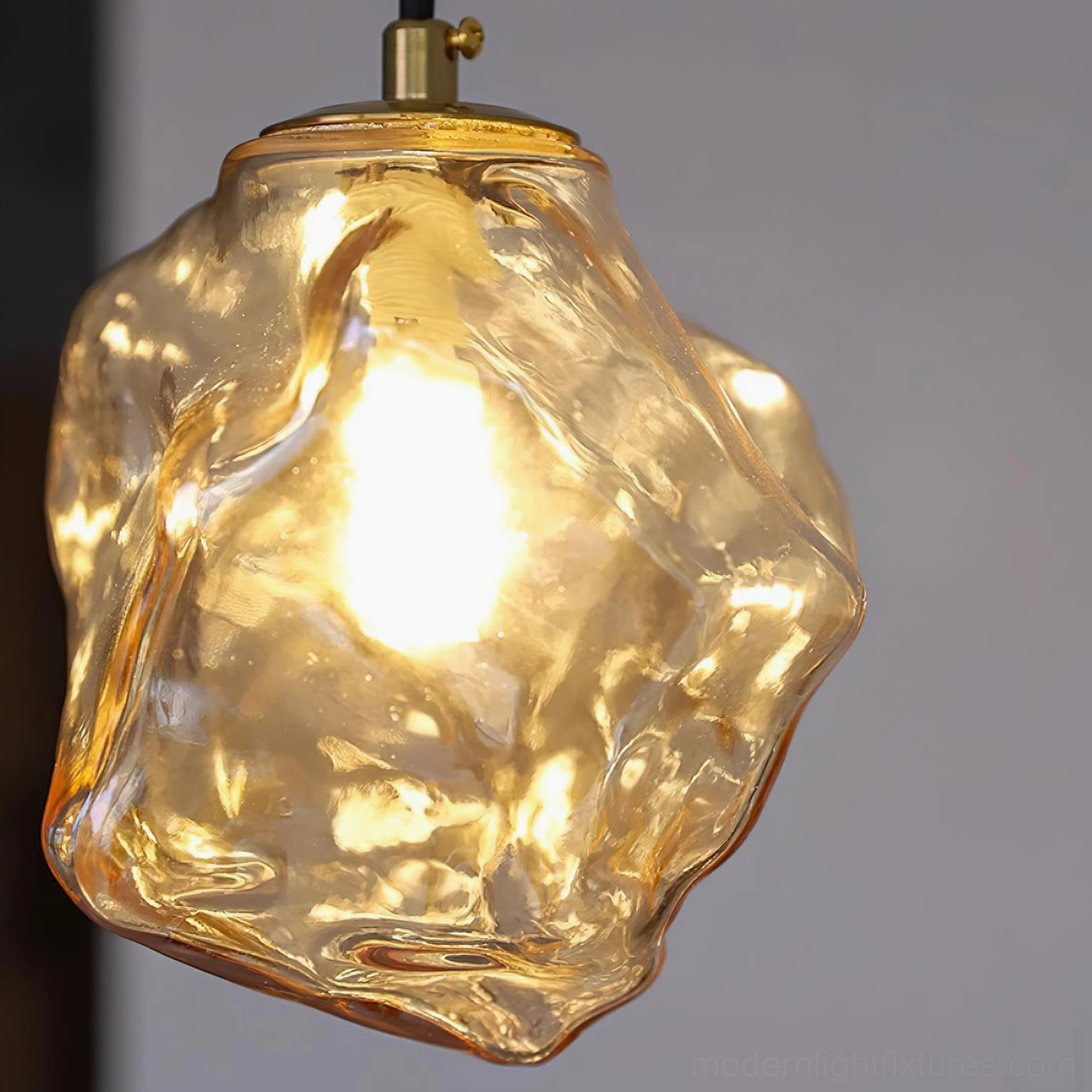 Mirza glass pendant light ambient lighting effect in contemporary home setting, textured glass light diffusion and artistic form