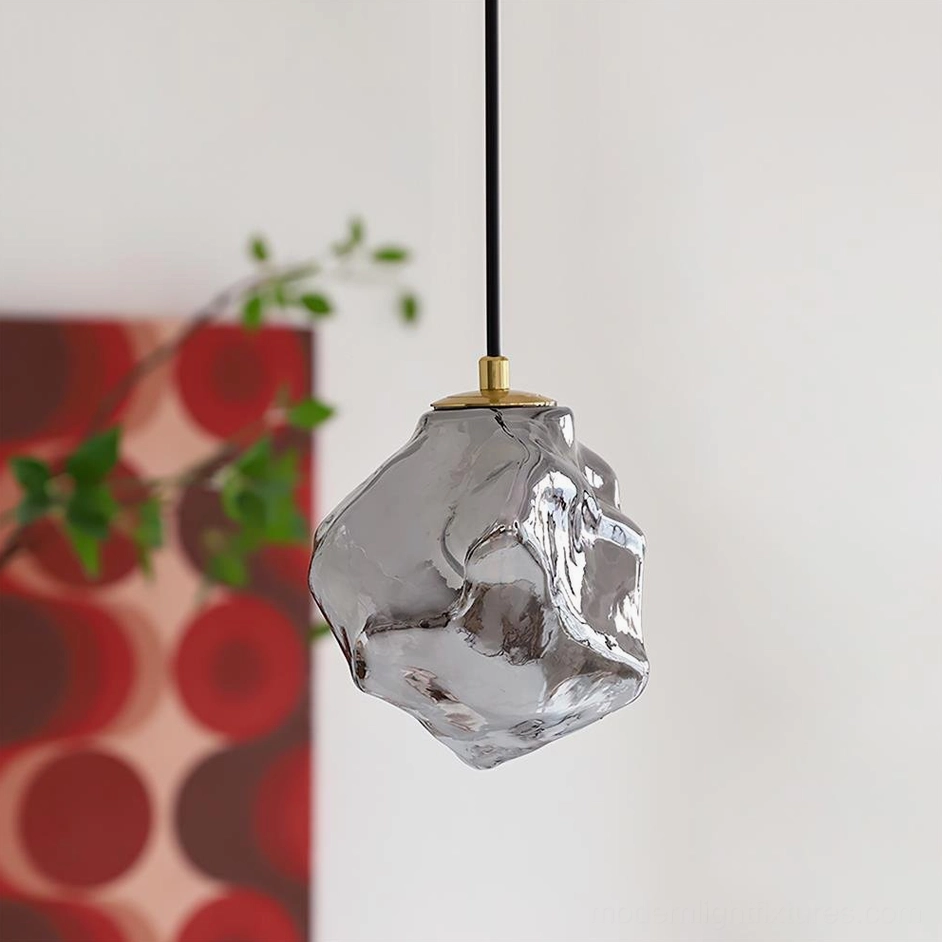 Mirza smoke gray pendant light in modern interior setting with textured glass shade and contemporary home decor