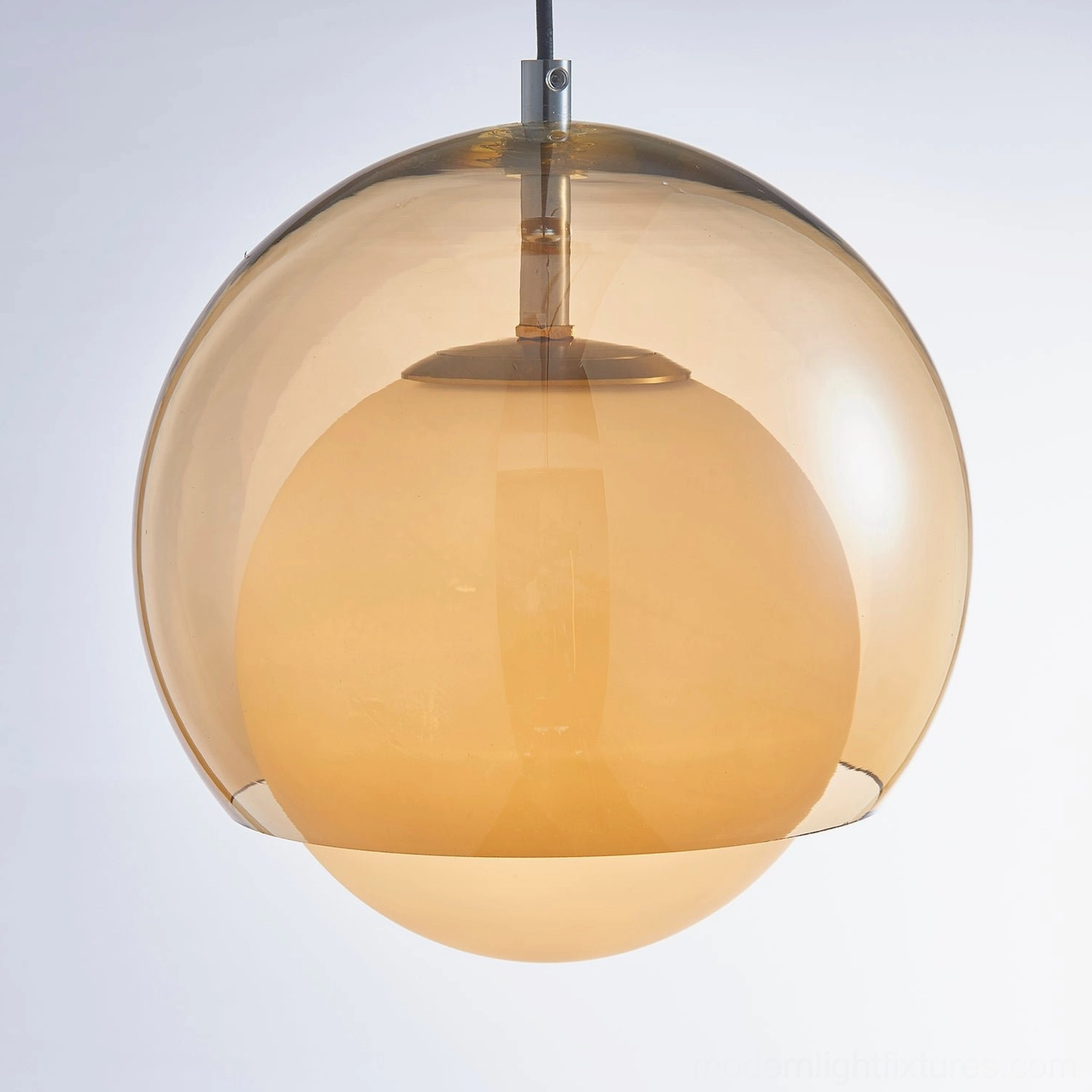 Misty pendant light showing G9 socket compatibility and metal frame craftsmanship detail