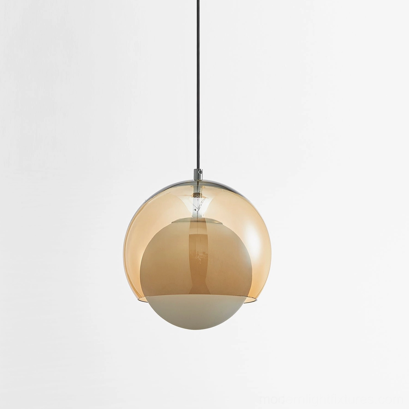 Misty frosted glass pendant light with visible internal light source and metallic fixture details