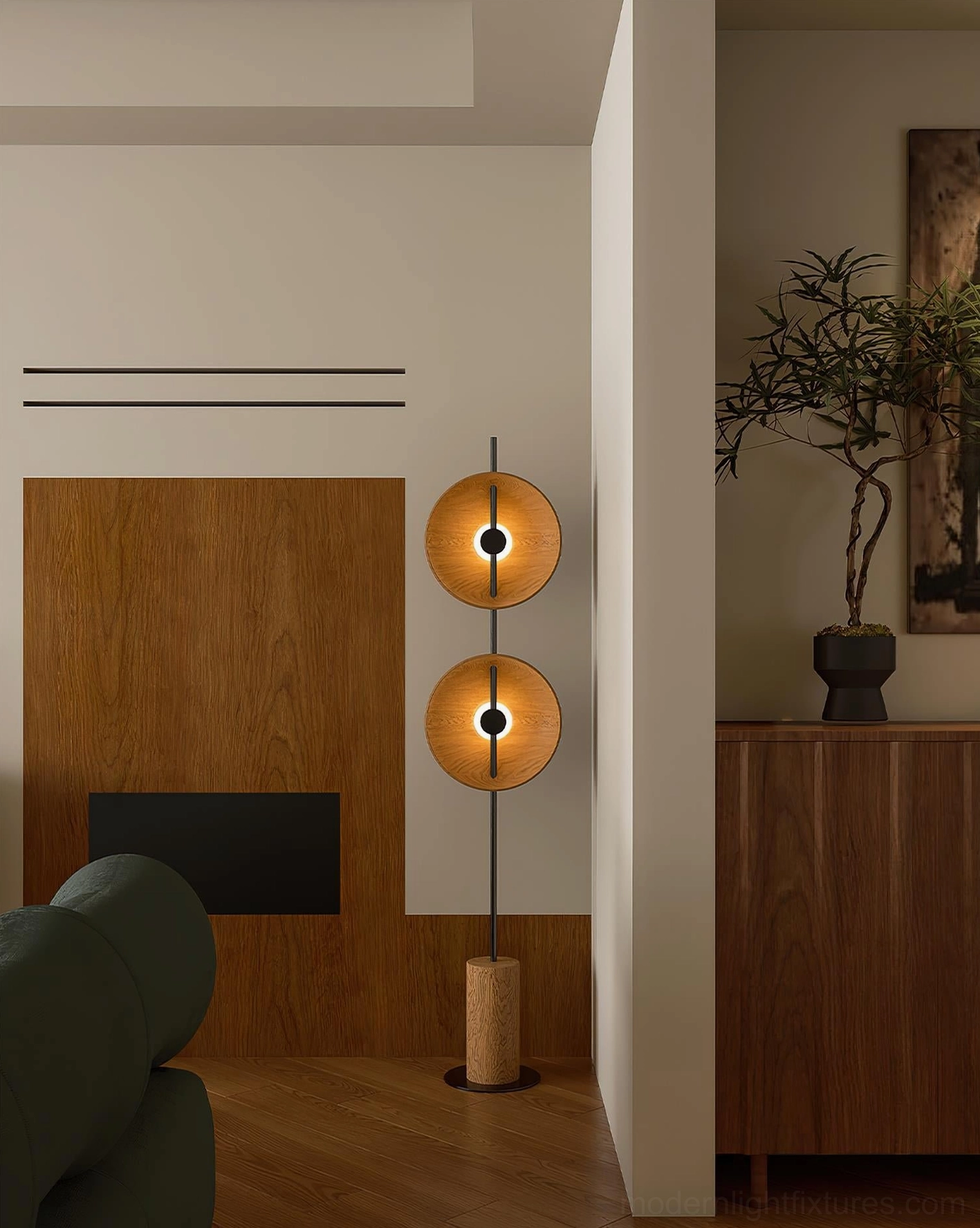 Mito modern floor lamp in living room corner displaying warm ambient lighting with natural wood finish