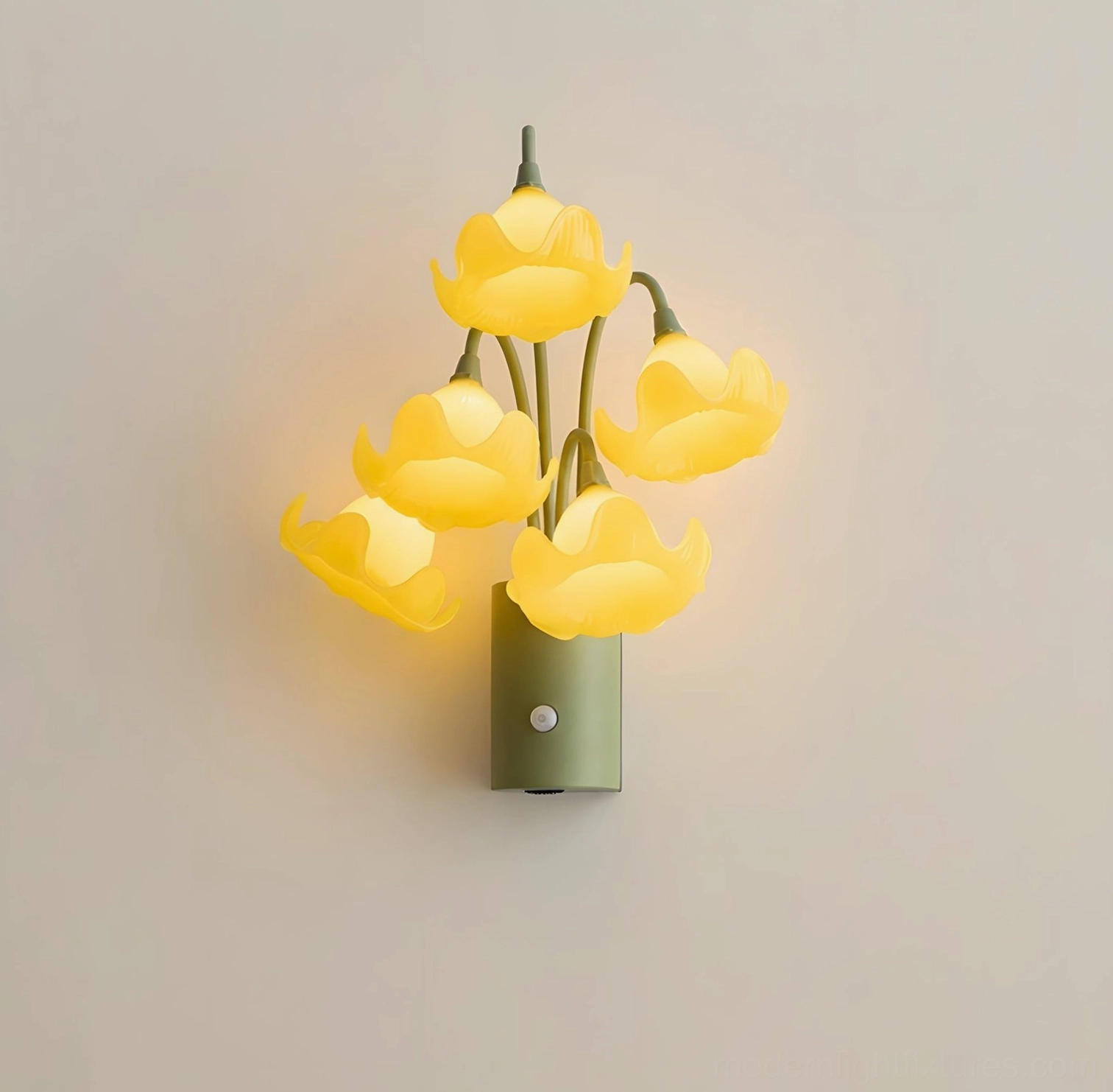 Mivella yellow acrylic flower wall sconce with warm amber-toned ruffled flower blooms and sage green metal base