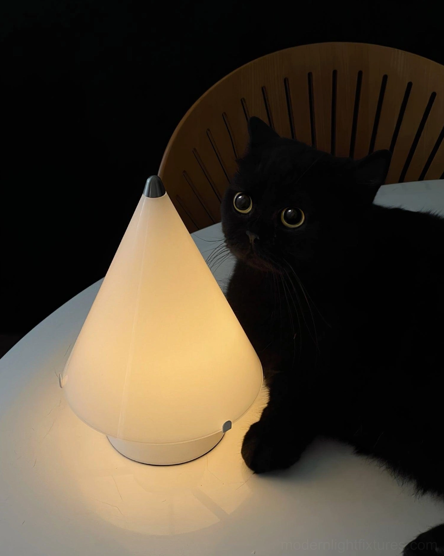 Miza compact white table lamp on dining table with warm light and home interior background