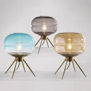 Moda table lamp color variations set showing amber, smoke gray, and gradient blue glass shades with matching brass bases