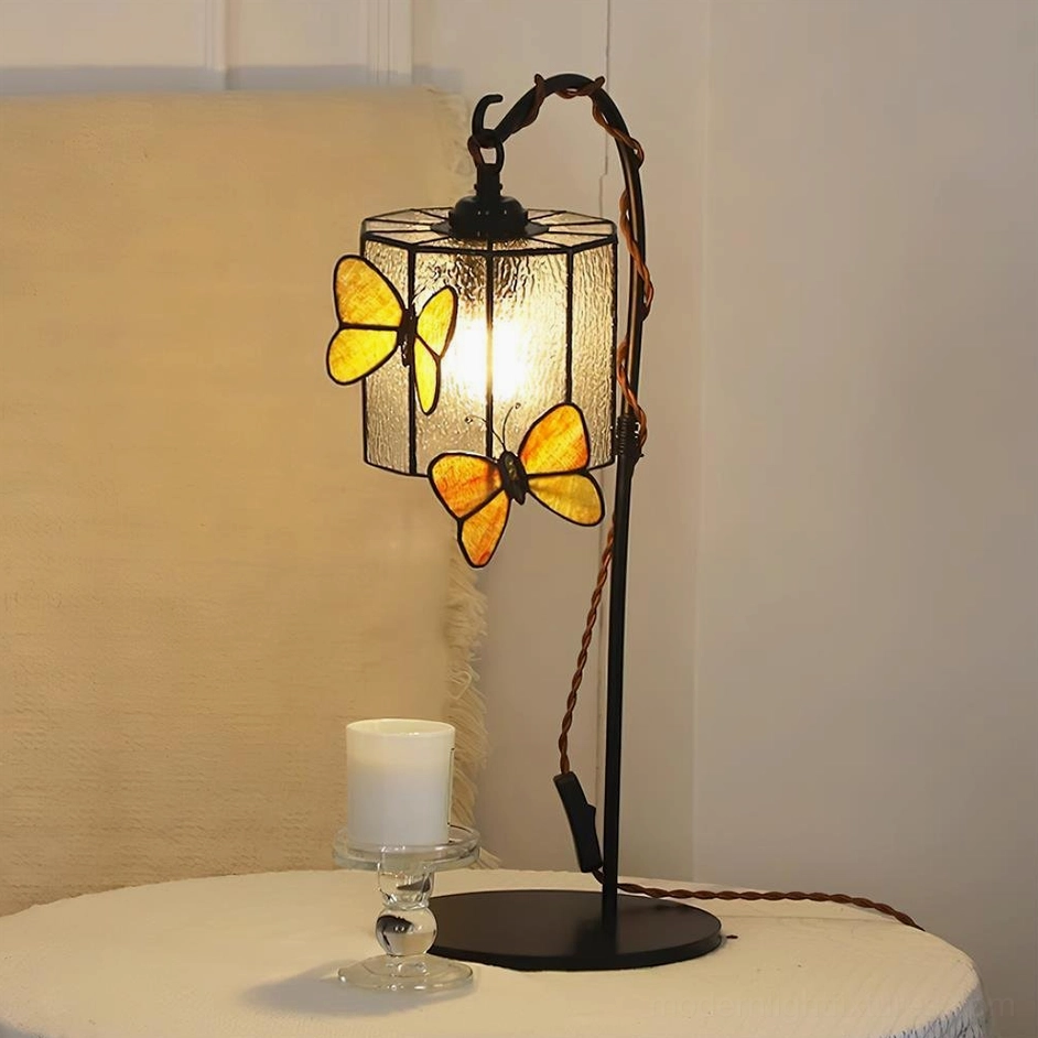 Model B conical stained glass butterfly table lamp with black metal vine-style stand