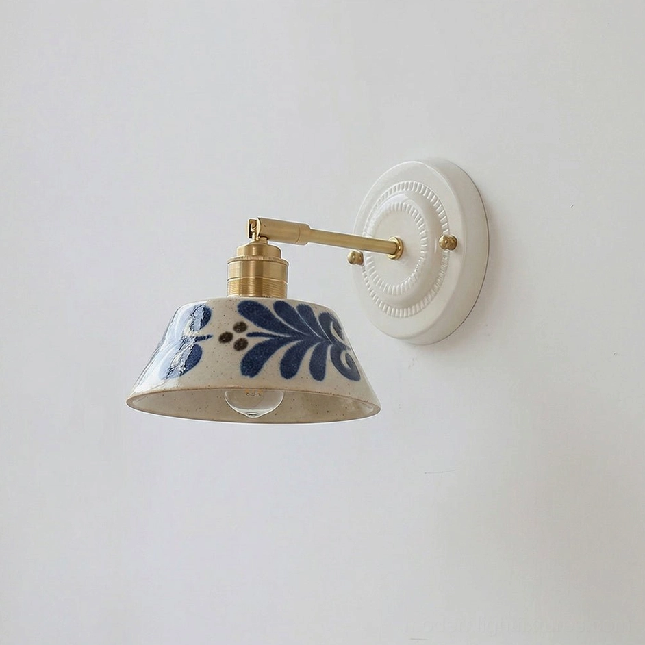 Model D handcrafted ceramic wall lamp with hand-painted indigo floral shade pattern