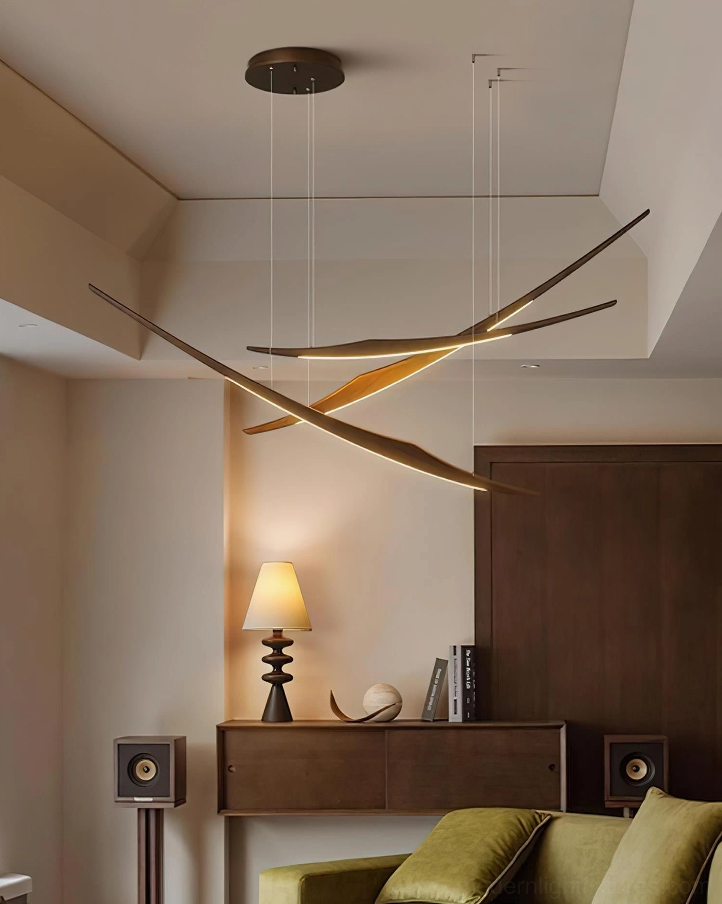 Asymmetrical wooden pendant chandelier with warm LED glow in mid-century modern living lounge