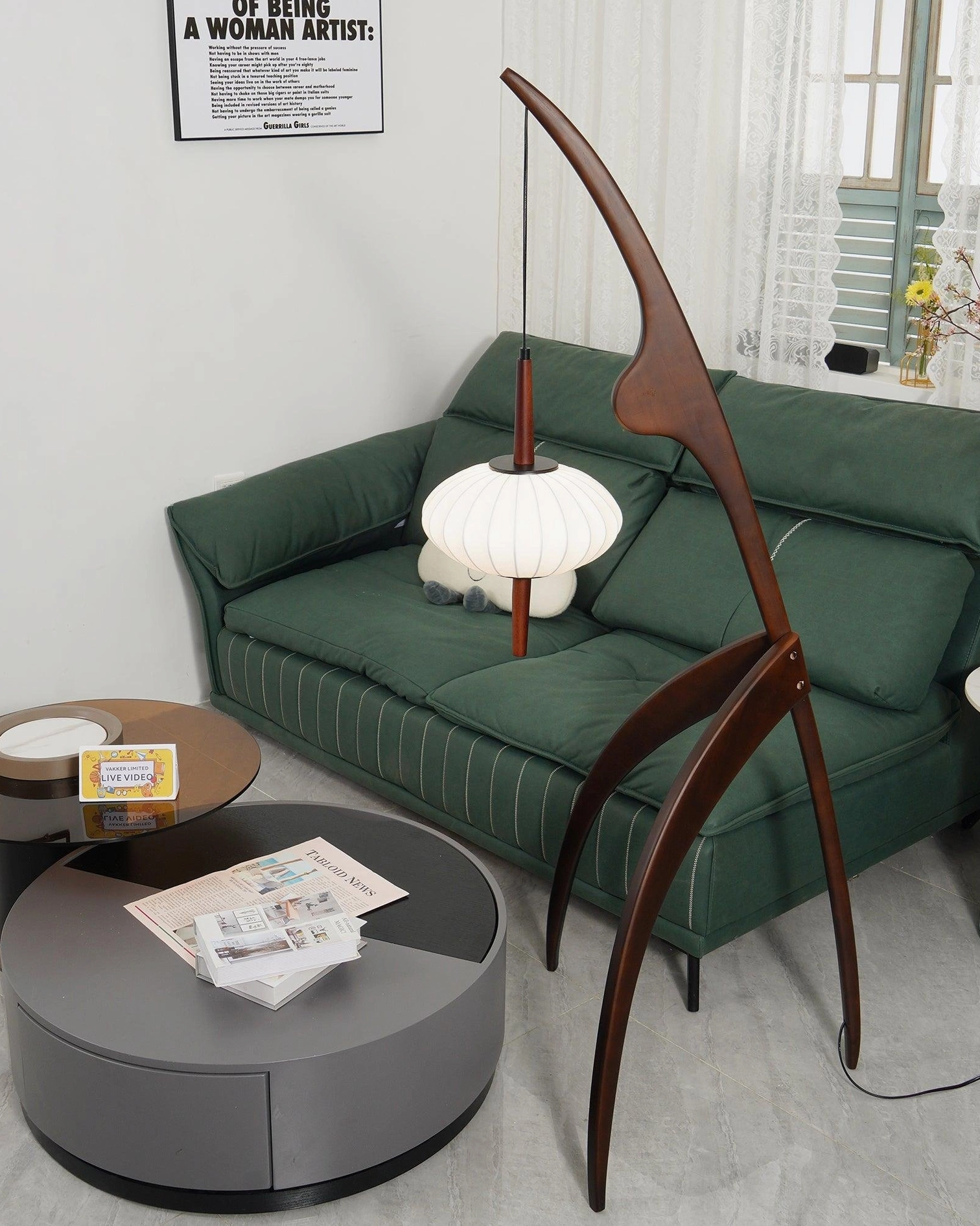 Modern arc floor lamp showing handcrafted wood frame curved design fabric shade