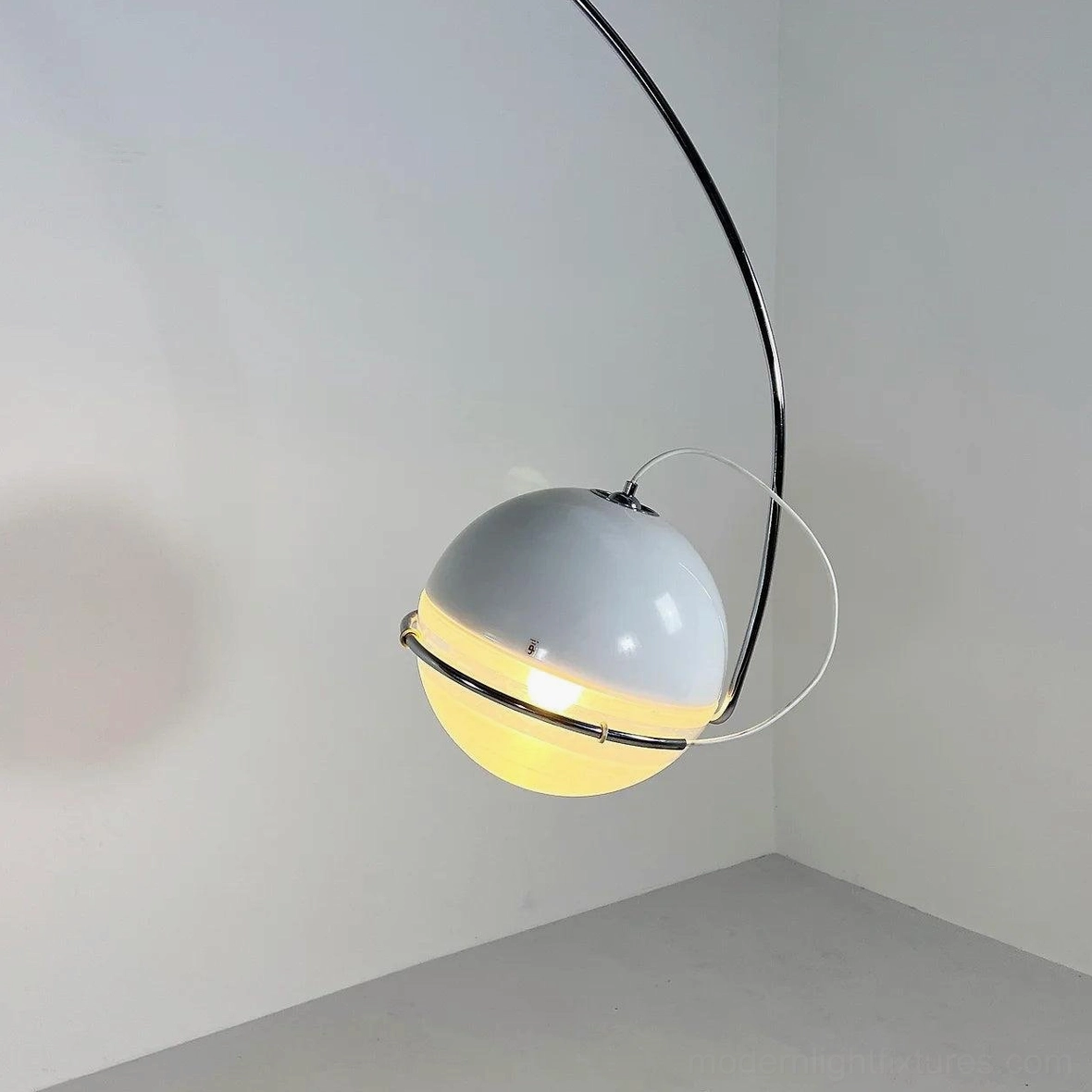 Modern arc floor lamp full product view highlighting sculptural design and mid-century aesthetic
